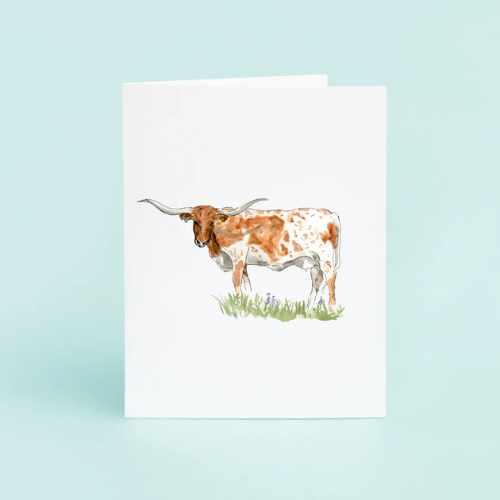 Greeting card featuring a watercolor illustration of a Texas Longhorn steer on eco-friendly linen paper.