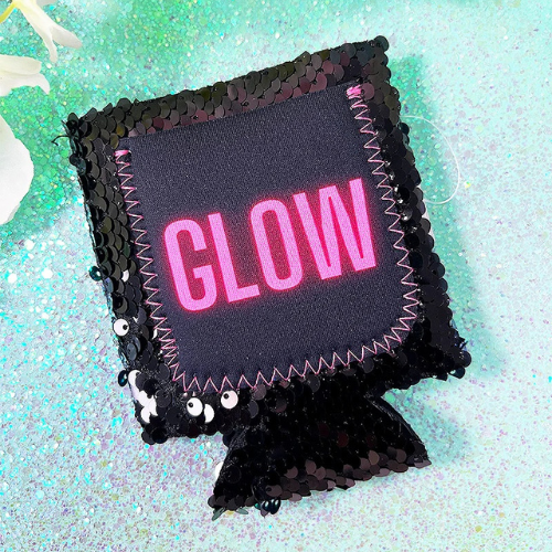 Glow Can Cooler with black sequins for regular and slim 12oz cans, stylish and practical drink accessory.