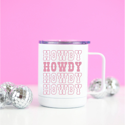 Howdy Rodeo Pink Travel Mug featuring vibrant pink "Howdy" text on a durable stainless steel mug.