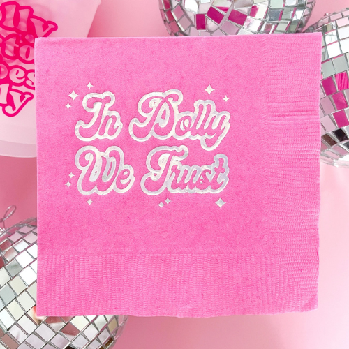 In Dolly We Trust cocktail napkins with metallic red foil design, perfect for parties and events.