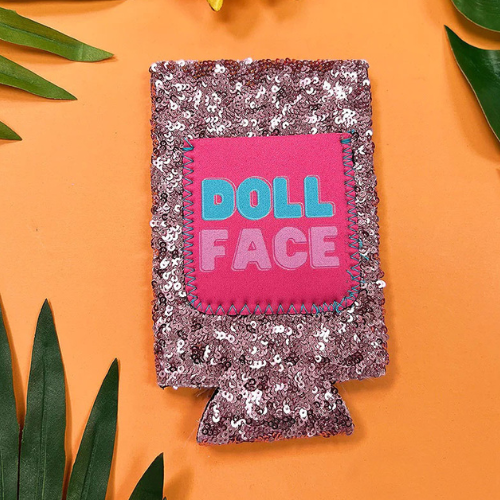 Doll Face Can Cooler for regular and slim 12oz cans, stylish drinkware accessory by Southern Grace.