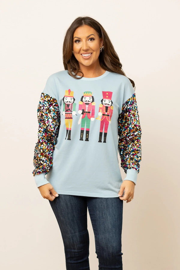 Nutcracker on Blue Sweatshirt with Sequins