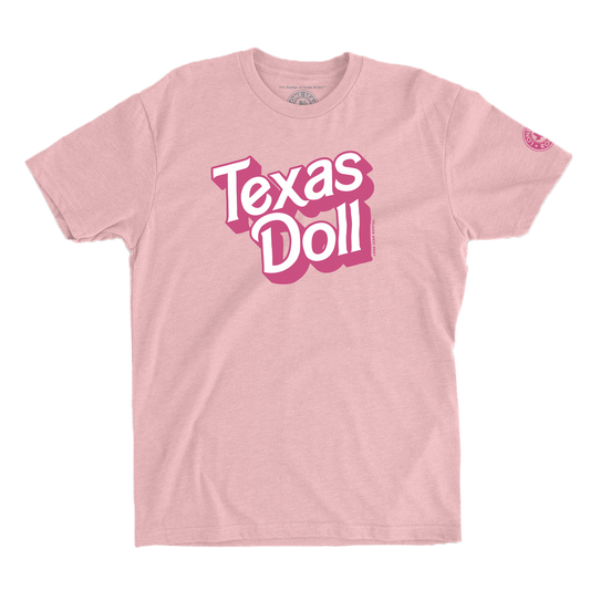 Texas Doll T-shirt in pink with Barbie-inspired red and white lettering.