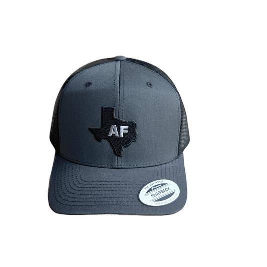 Texas AF Trucker Hat featuring a bold patch design and adjustable snapback closure.